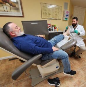 Our sports injury doctor treating a client from Poughkeepsie, NY